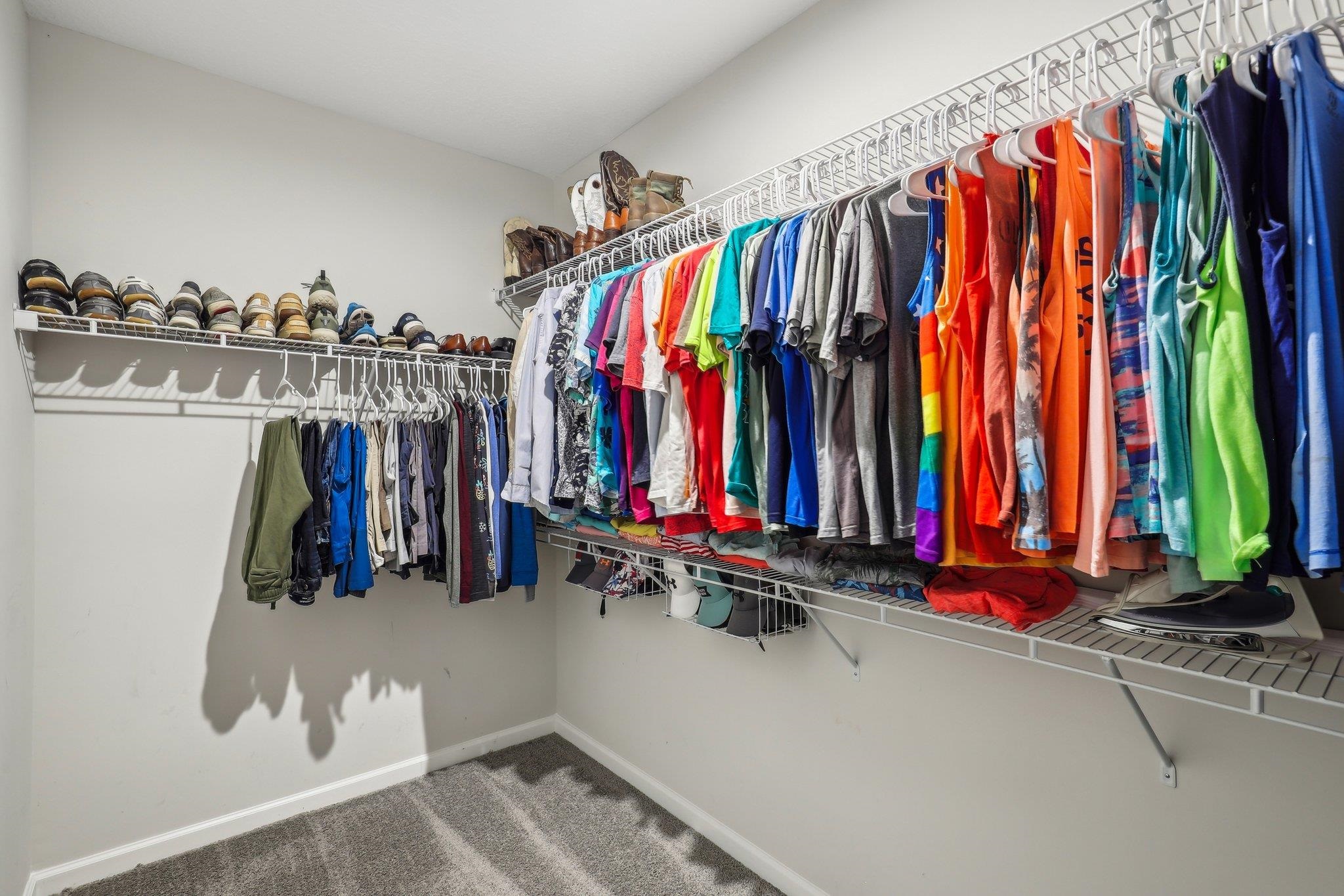 352 Footbridge Road St. Johns, FL 32259 - Photo 23 of 66 a view of walk in closet with clothes and shoes