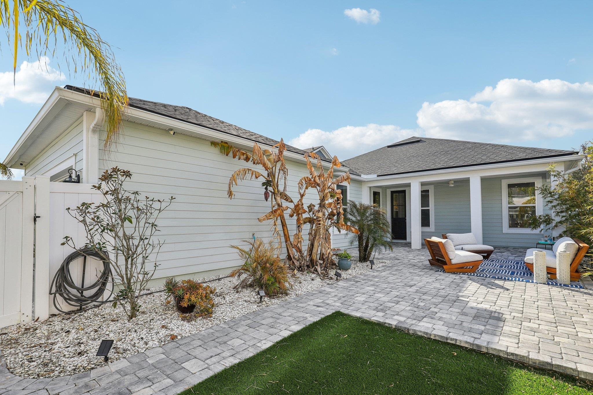 352 Footbridge Road St. Johns, FL 32259 - Photo 30 of 66 a front view of a house with patio
