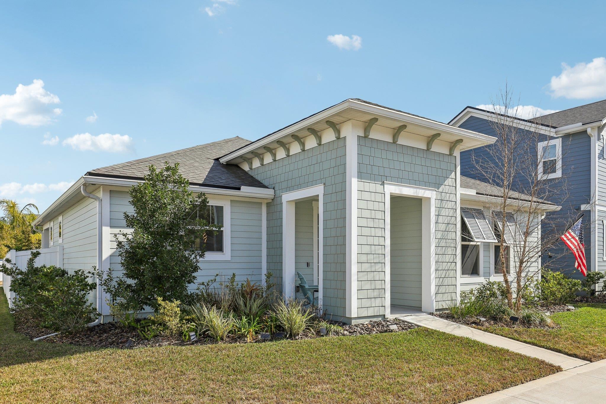 352 Footbridge Road St. Johns, FL 32259 - Photo 3 of 66 a front view of a house with garden