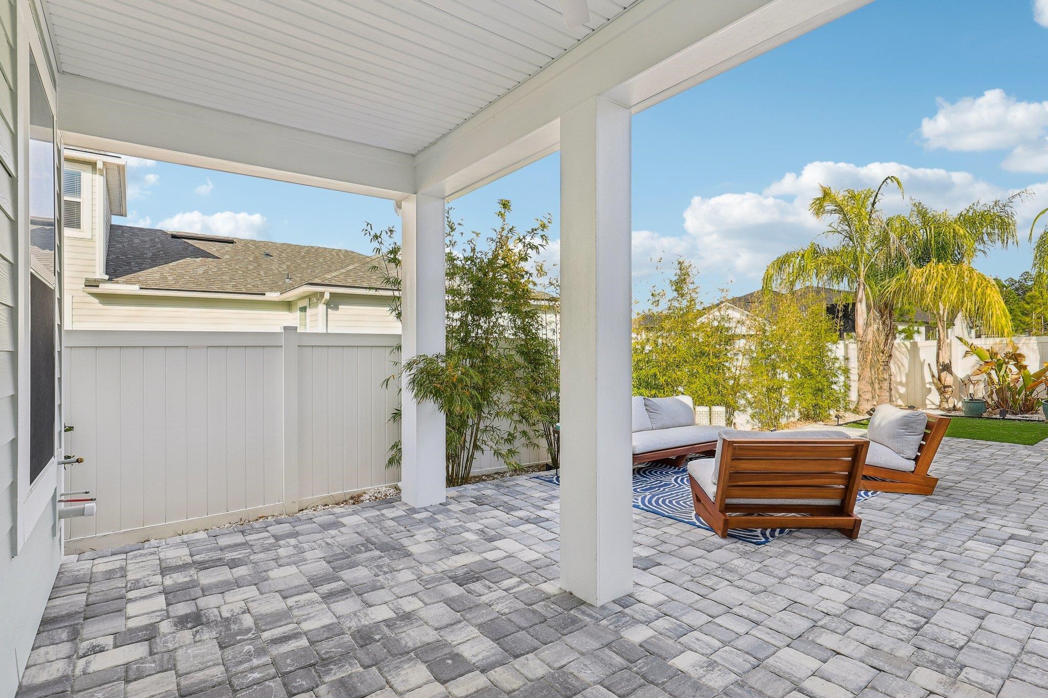 352 Footbridge Road St. Johns, FL 32259 - Photo 32 of 66 a backyard of a house with outdoor seating