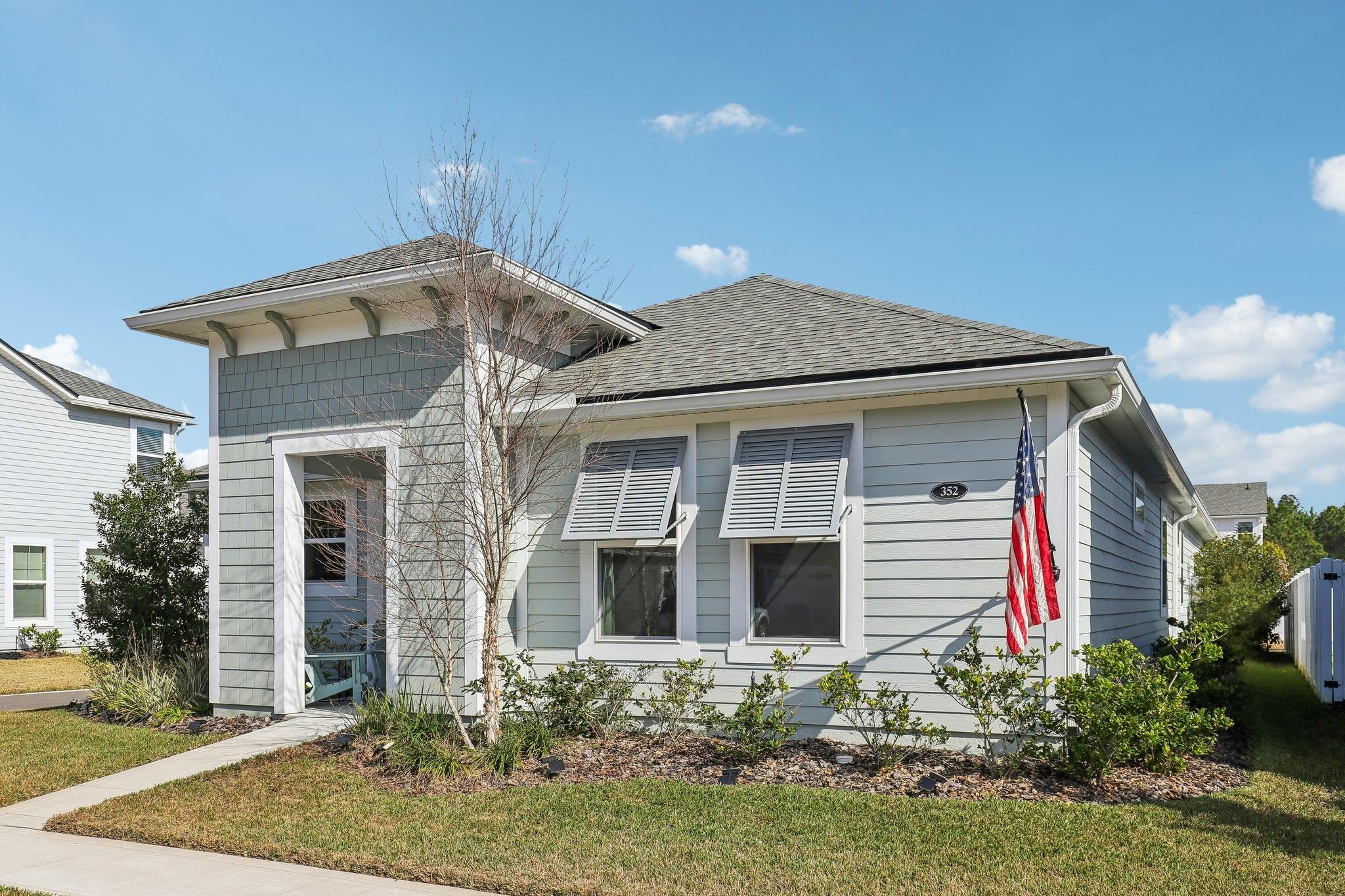 352 Footbridge Road St. Johns, FL 32259 - Photo 4 of 66 a front view of a house with garden