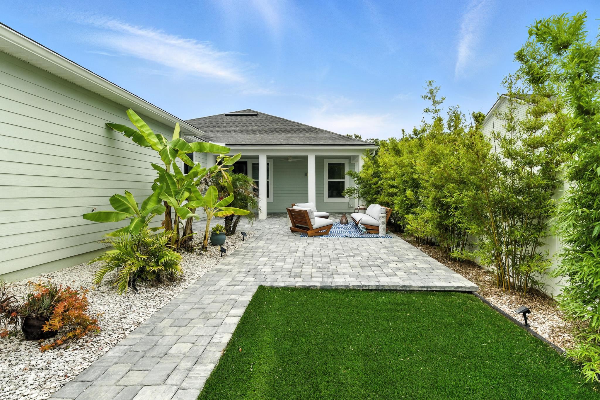 352 Footbridge Road St. Johns, FL 32259 - Photo 47 of 66 a view of a backyard with a garden and plants