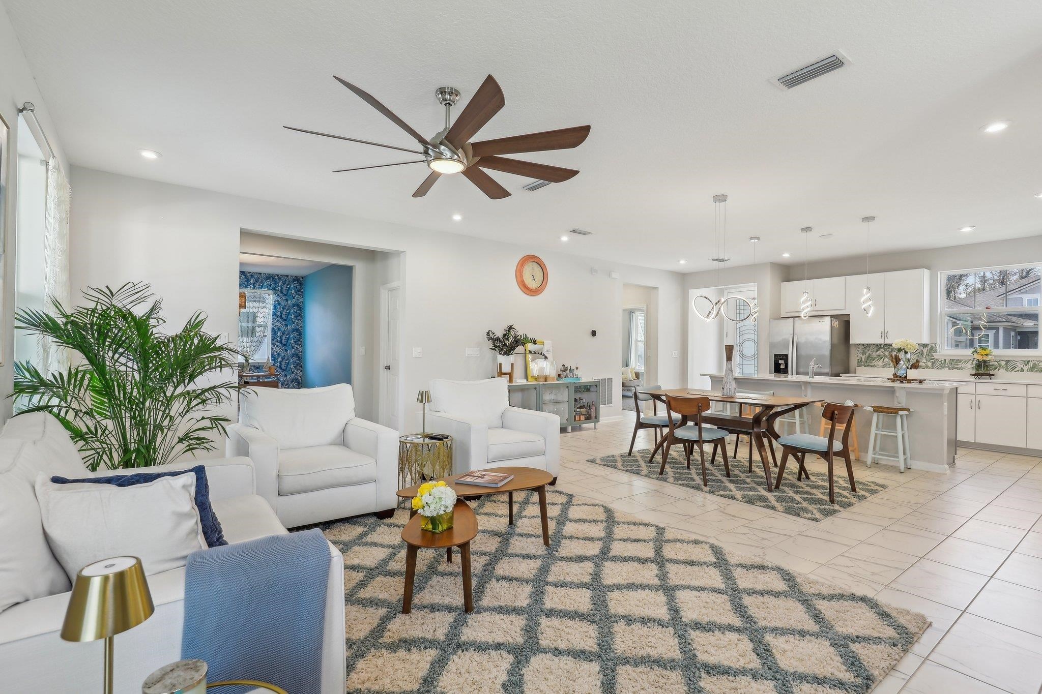 352 Footbridge Road St. Johns, FL 32259 - Photo 8 of 66 a living room with furniture a window and a potted plant