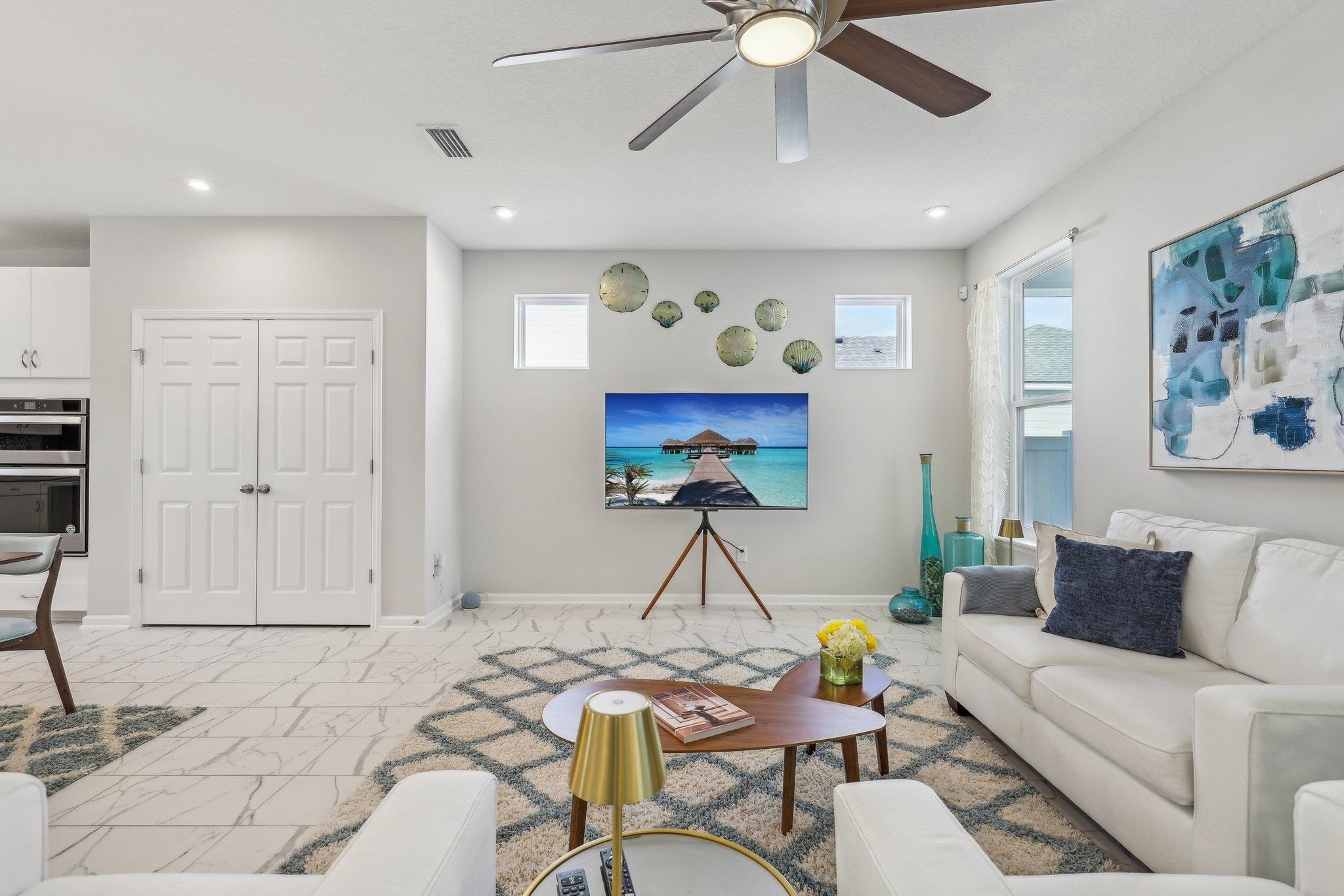 352 Footbridge Road St. Johns, FL 32259 - Photo 10 of 66 a living room with furniture and a chandelier