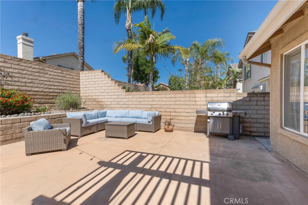 3843 San Gabriel Street Simi Valley, CA 93063 - Photo 48 of 52 a view of a patio with couches and potted plants