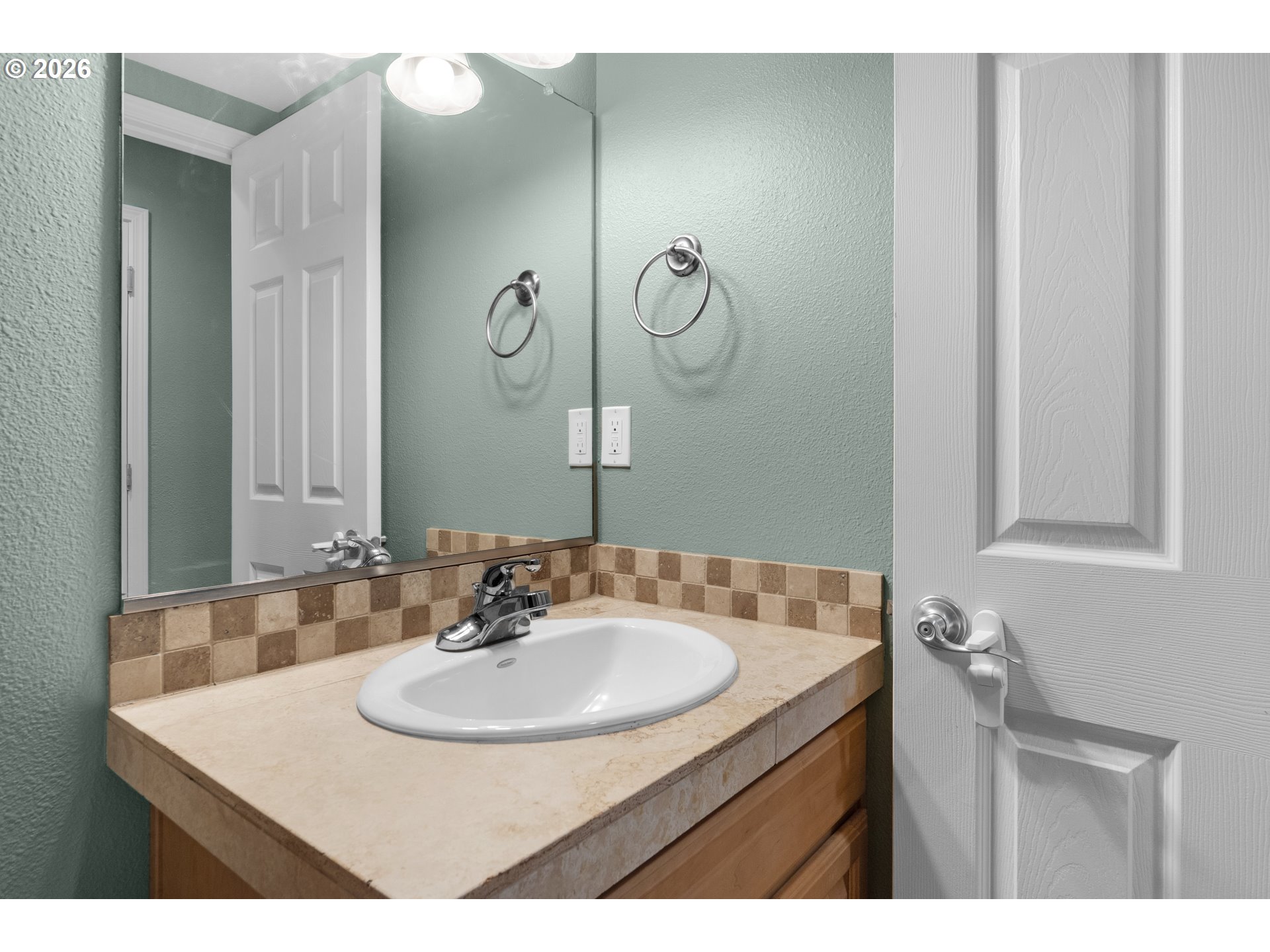 13150 D Street Nehalem, OR 97131 - Photo 29 of 42 a bathroom with a sink and a mirror