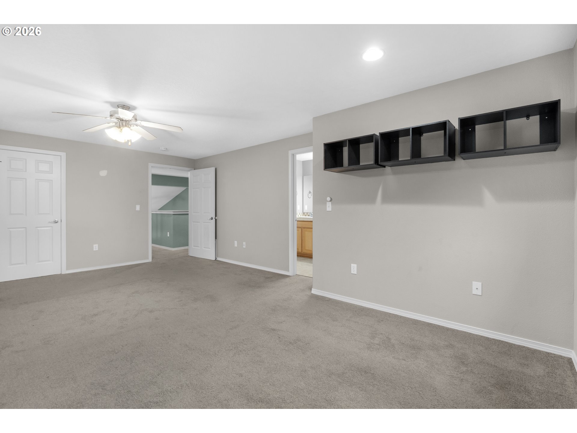 13150 D Street Nehalem, OR 97131 - Photo 32 of 42 a view of a big room with windows and ceiling fan