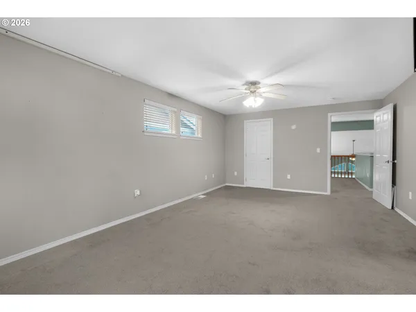 a bathroom with a sink vanity and a mirror