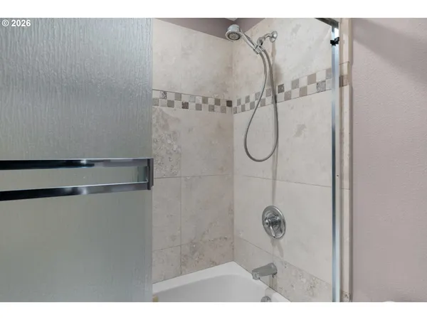 a bathroom with a sink vanity and a mirror