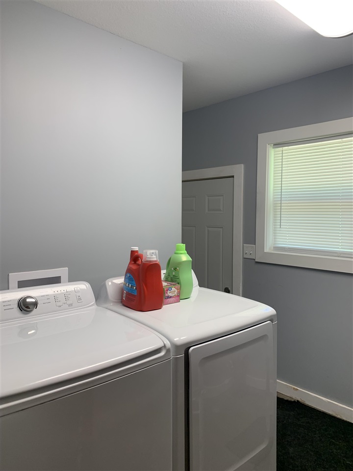 506 Ridge Street Mount Carroll, IL 61053 - Photo 17 of 17 a utility room with dryer and washer