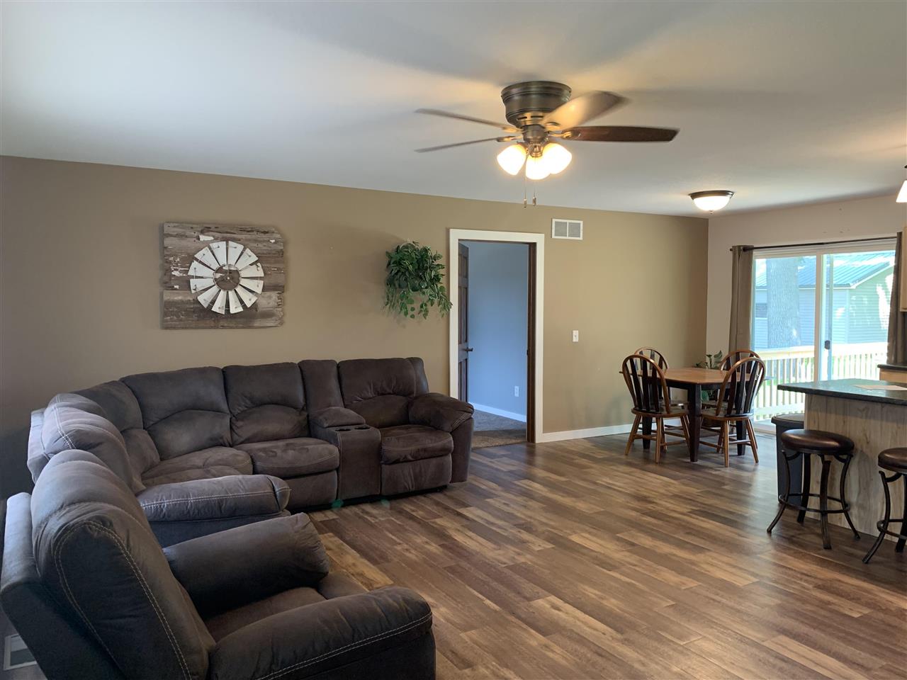 506 Ridge Street Mount Carroll, IL 61053 - Photo 5 of 17 a living room with furniture and wooden floor