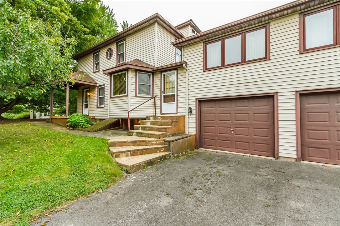 10 Buffalo Road Bergen, NY 14416 - Photo 1 of 1 Side entrance to main house; spacious rec room/gre