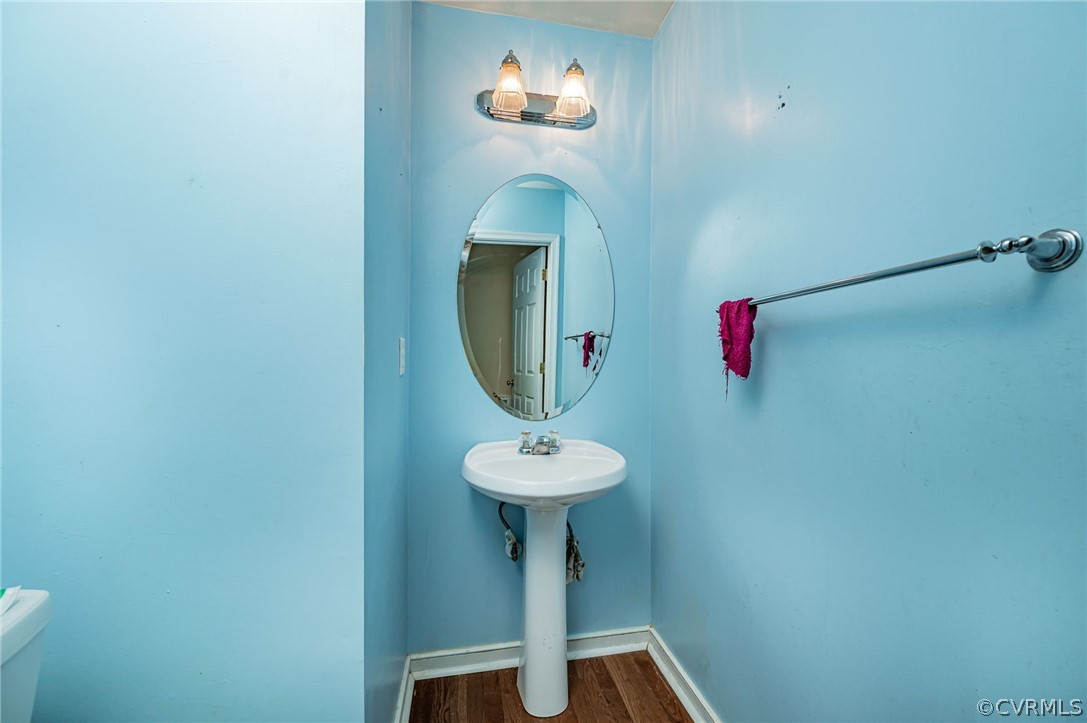 264 Scotch Pine Drive Sandston, VA 23150 - Photo 14 of 26 a bathroom with a sink and a mirror