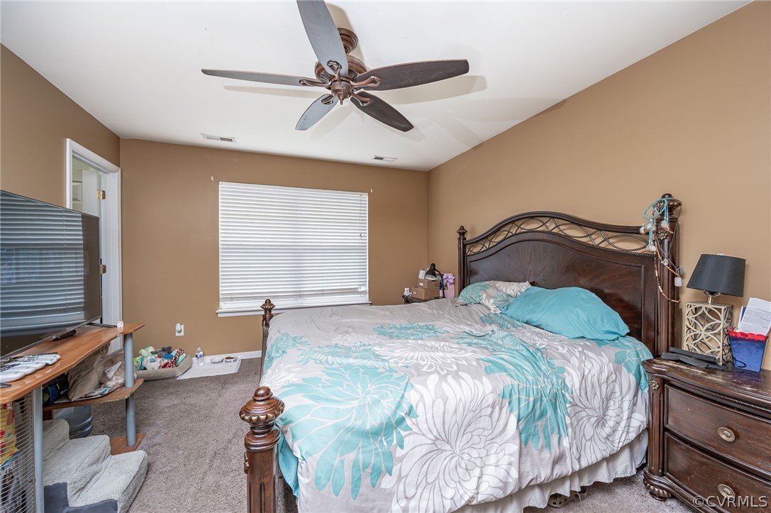 264 Scotch Pine Drive Sandston, VA 23150 - Photo 15 of 26 a bedroom with a bed and window