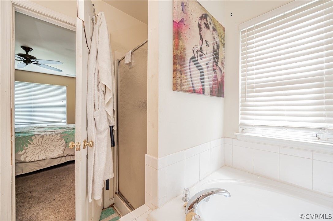 264 Scotch Pine Drive Sandston, VA 23150 - Photo 18 of 26 a bathroom with a bathtub and shower
