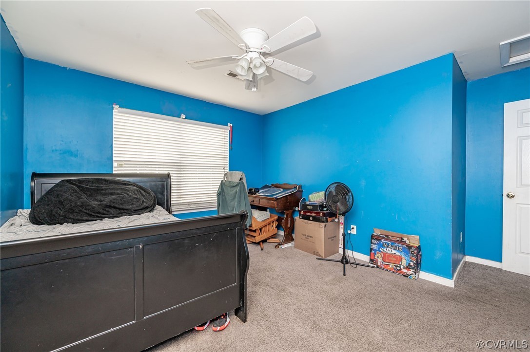 264 Scotch Pine Drive Sandston, VA 23150 - Photo 20 of 26 a living room with furniture and a chandelier