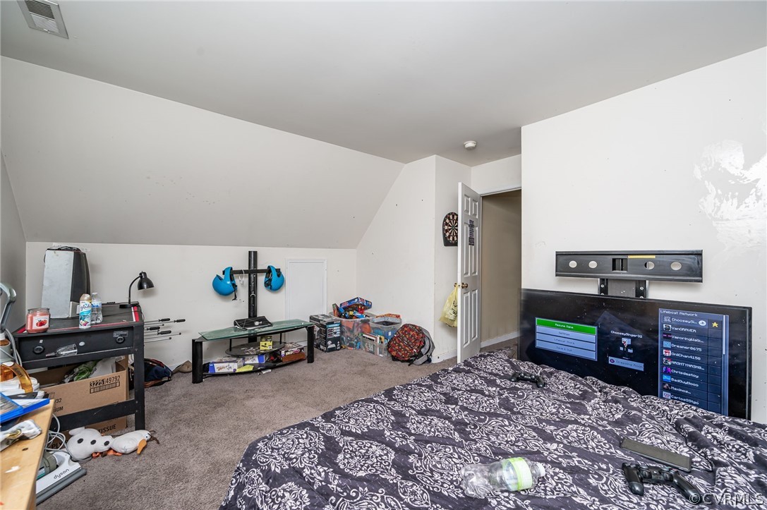 264 Scotch Pine Drive Sandston, VA 23150 - Photo 25 of 26 a bedroom with furniture and a wooden floor