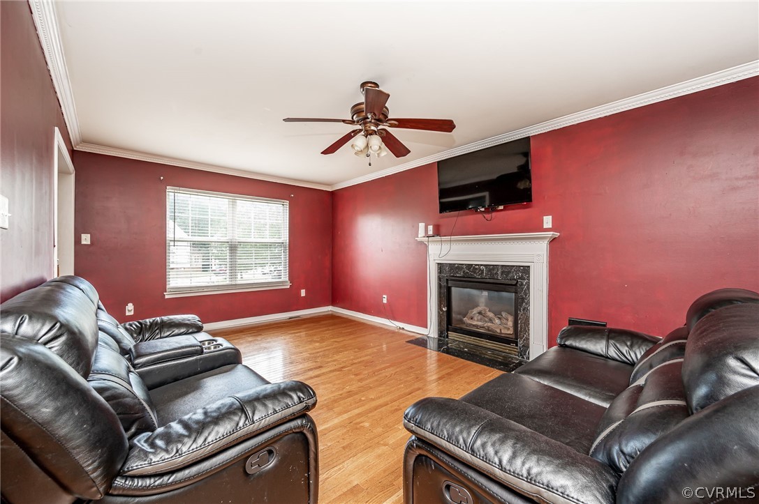 264 Scotch Pine Drive Sandston, VA 23150 - Photo 8 of 26 a living room with furniture fireplace and a window