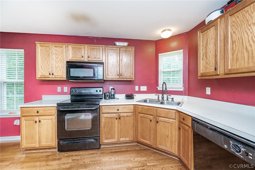 264 Scotch Pine Drive Sandston, VA 23150 - Photo 10 of 26 a kitchen with a sink stove top oven and microwave