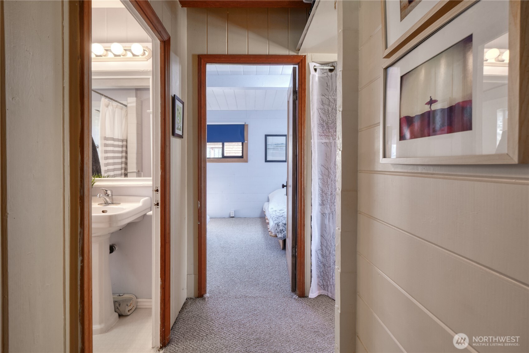 684 Mallard Drive Point Roberts, WA 98281 - Photo 13 of 37 a view of a hallway with wooden floor and a bathroom
