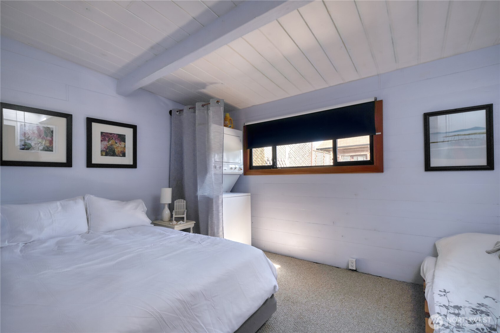 684 Mallard Drive Point Roberts, WA 98281 - Photo 14 of 37 a bedroom with a large bed and a window