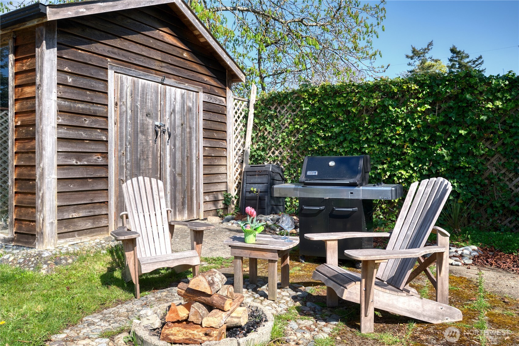 684 Mallard Drive Point Roberts, WA 98281 - Photo 19 of 37 a view of a chair and table in backyard of the house