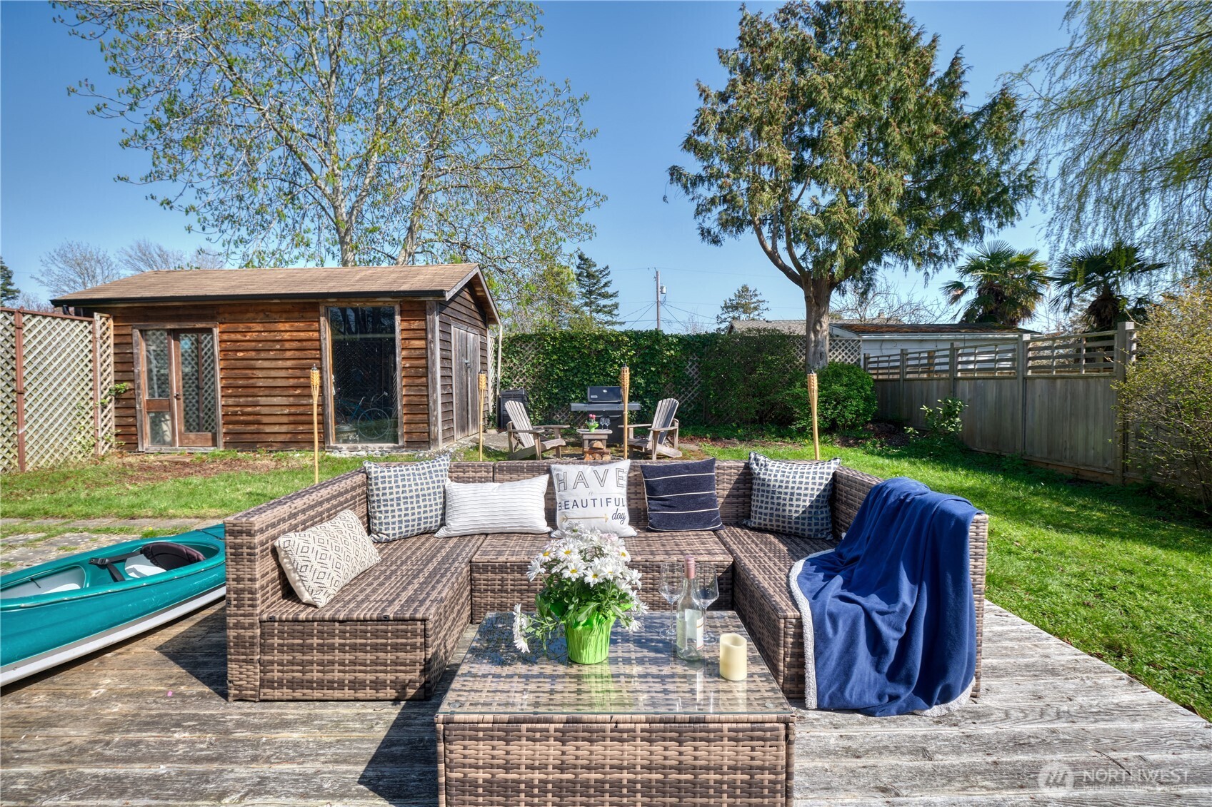 684 Mallard Drive Point Roberts, WA 98281 - Photo 30 of 37 a view of a patio with couches chairs and a fire pit