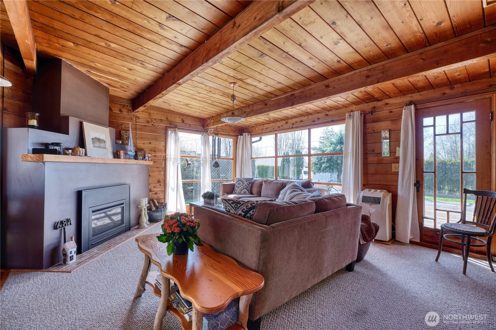 684 Mallard Drive Point Roberts, WA 98281 - Photo 3 of 37 a living room with furniture and a fireplace