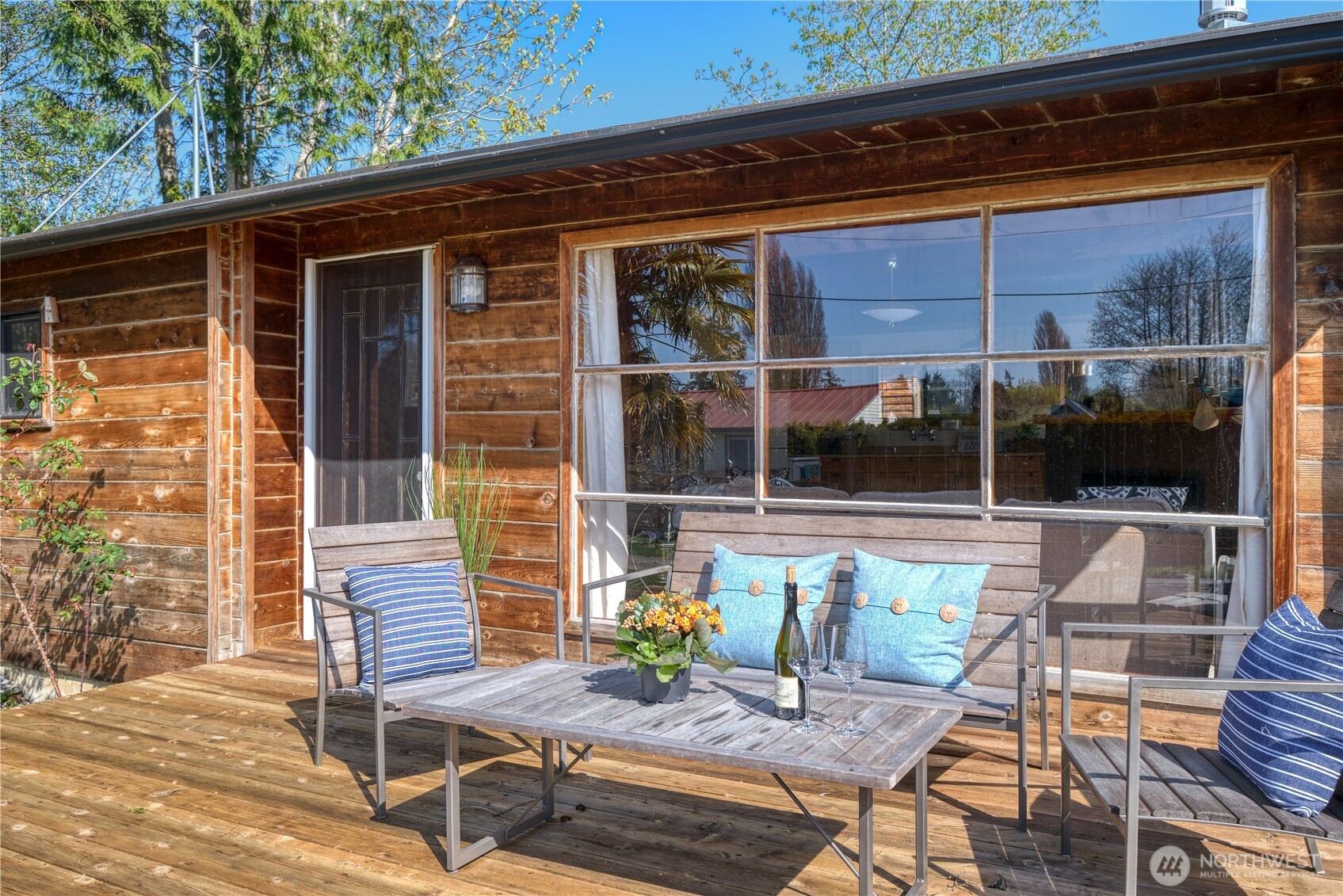 684 Mallard Drive Point Roberts, WA 98281 - Photo 36 of 37 a view of a patio with a table and chairs