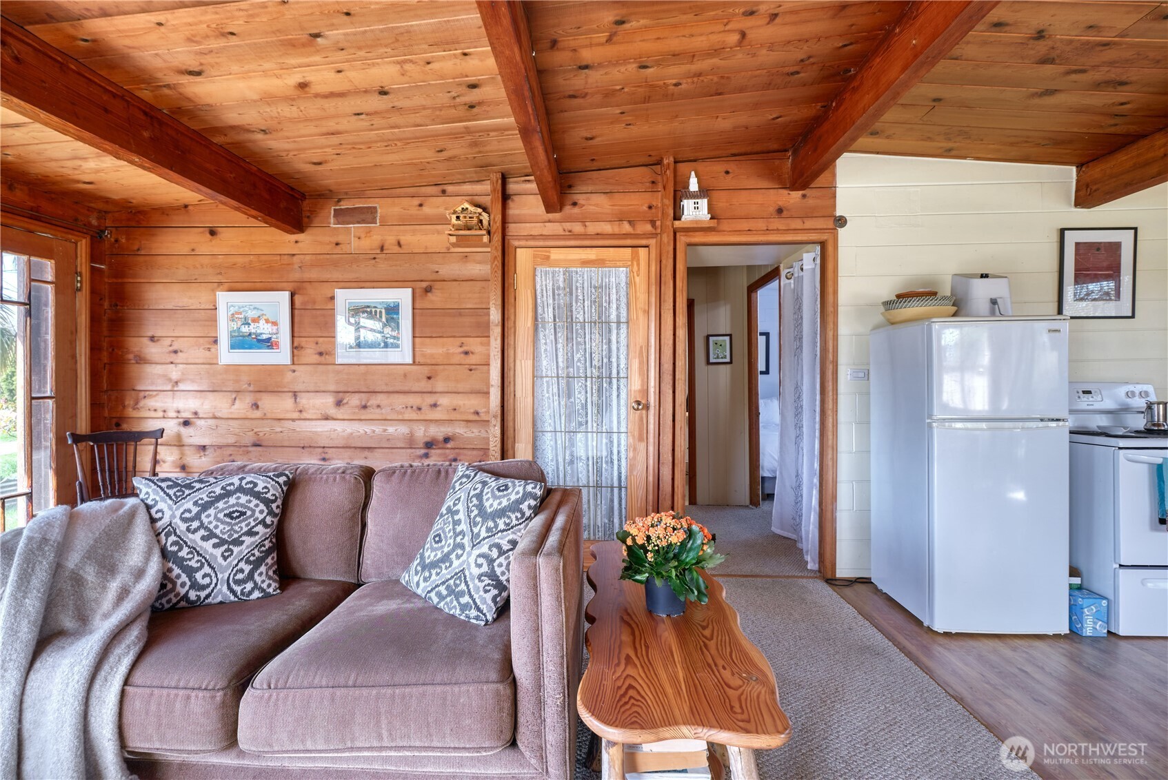 684 Mallard Drive Point Roberts, WA 98281 - Photo 7 of 37 a living room with furniture and flowers