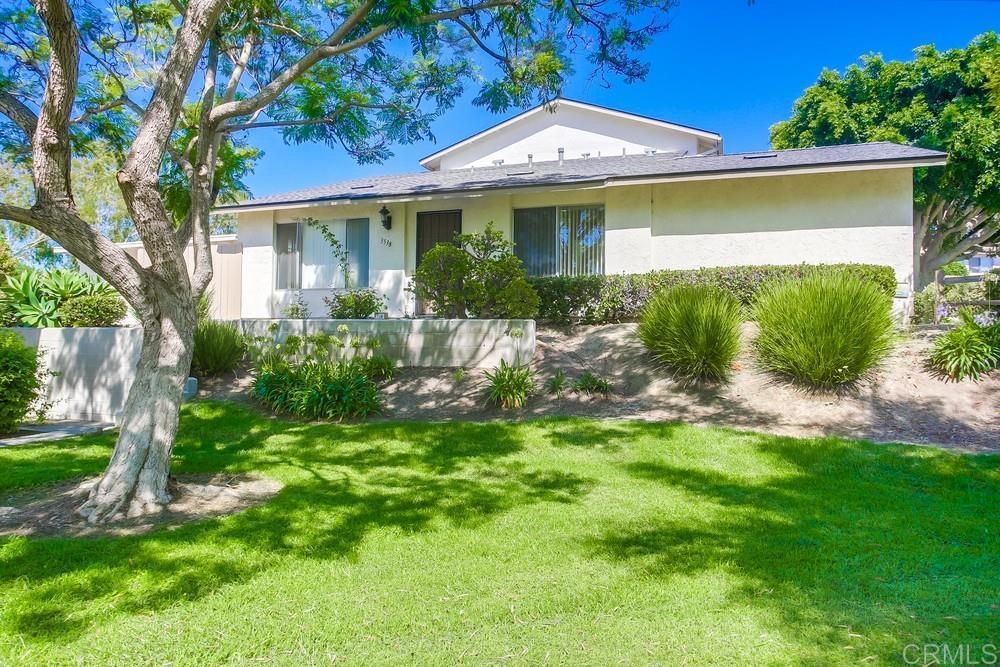 3538 Sandpiper Place Oceanside, CA 92056 - Photo 1 of 16 a front view of a house with a garden