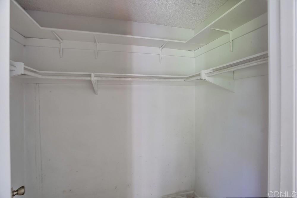 3538 Sandpiper Place Oceanside, CA 92056 - Photo 13 of 16 a view of a room with racks on the wall