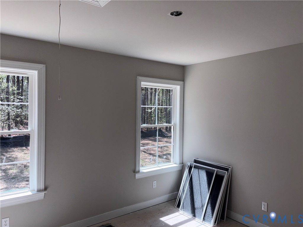 24178 Cabin Point Road Waverly, VA 23890 - Photo 13 of 14 an empty room with windows