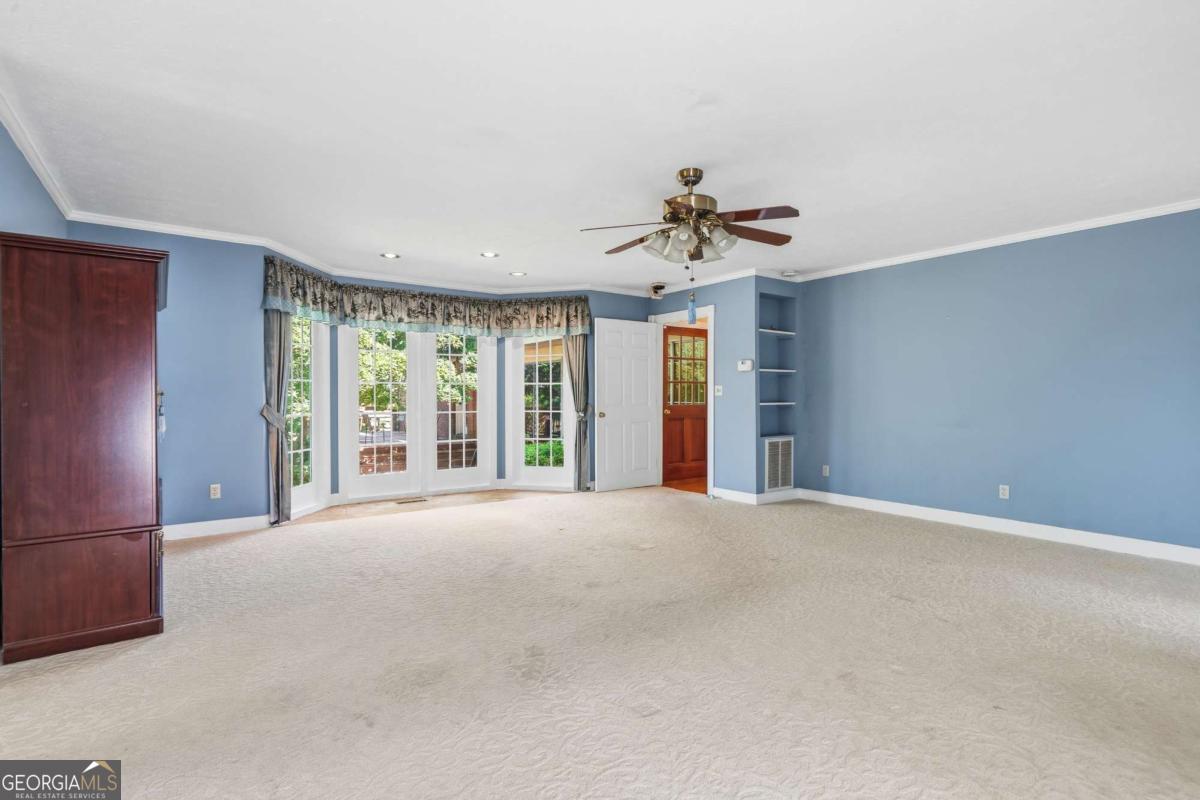 56 Claymont Road McIntyre, GA 31054 - Photo 28 of 63 a view of an empty room with a window