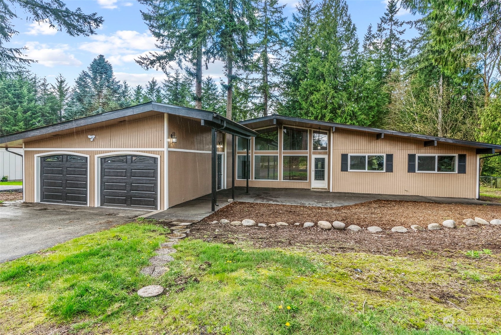 122 Fircrest Road Chehalis, WA 98532 - Photo 1 of 31 a house with trees in the background