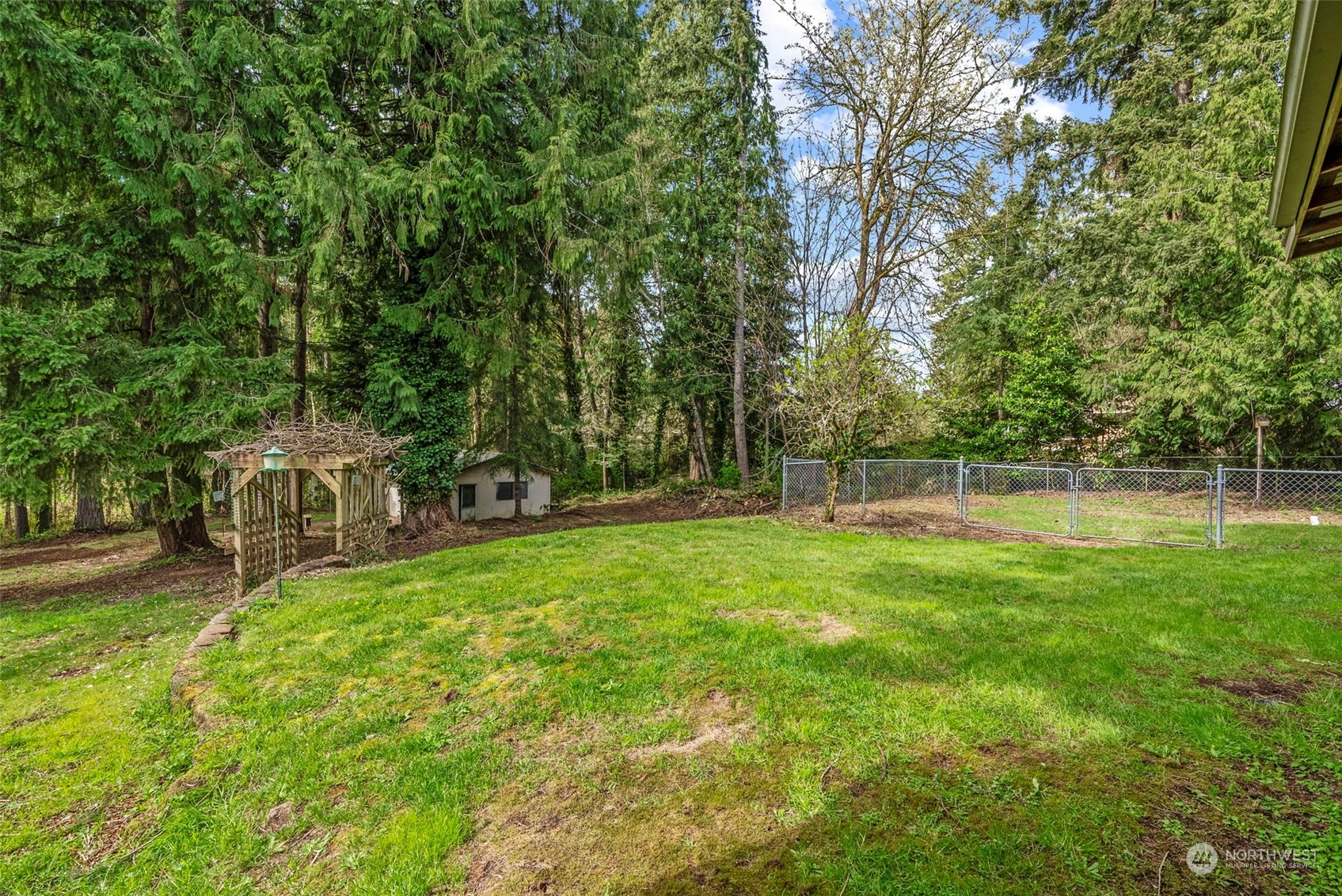 122 Fircrest Road Chehalis, WA 98532 - Photo 28 of 31 a view of a house with a backyard