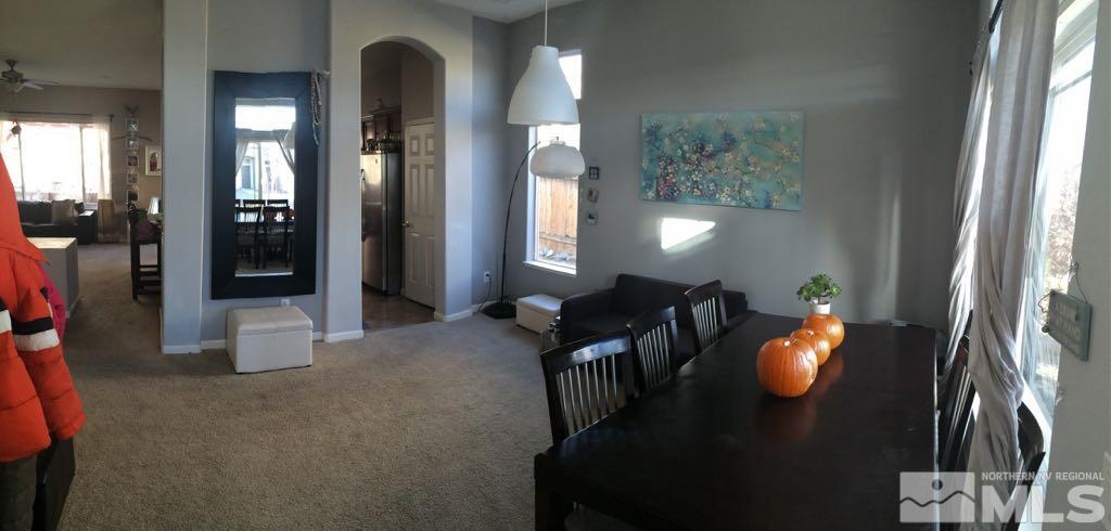 1441 Hagar Road Reno, NV 89506 - Photo 15 of 18 a view of a livingroom with furniture and a chandelier