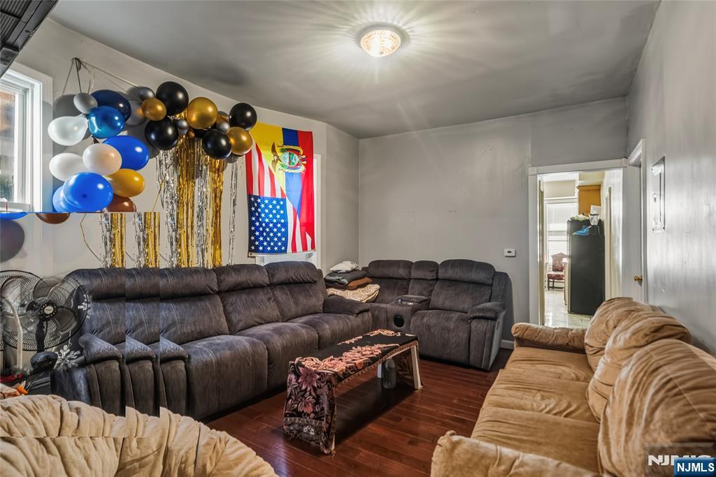 155 Myrtle Avenue Irvington, NJ 07111 - Photo 19 of 26 a living room with furniture and a couch