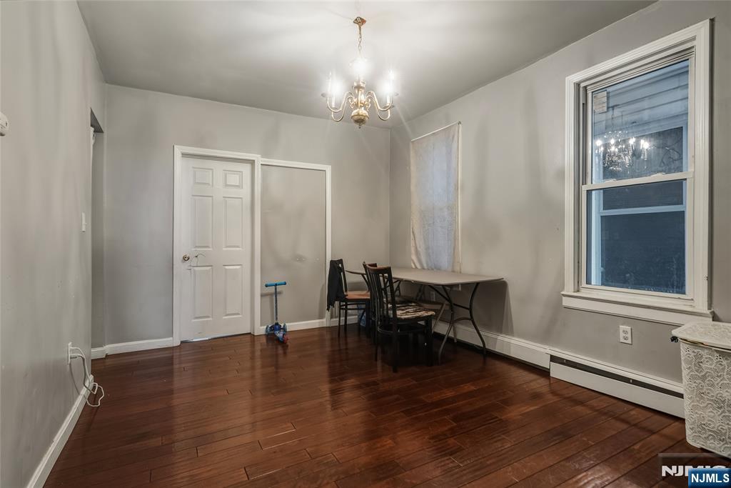 155 Myrtle Avenue Irvington, NJ 07111 - Photo 9 of 26 a view of a livingroom with furniture window and wooden floor