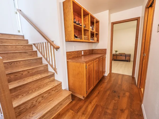 a view of entryway with wooden floor