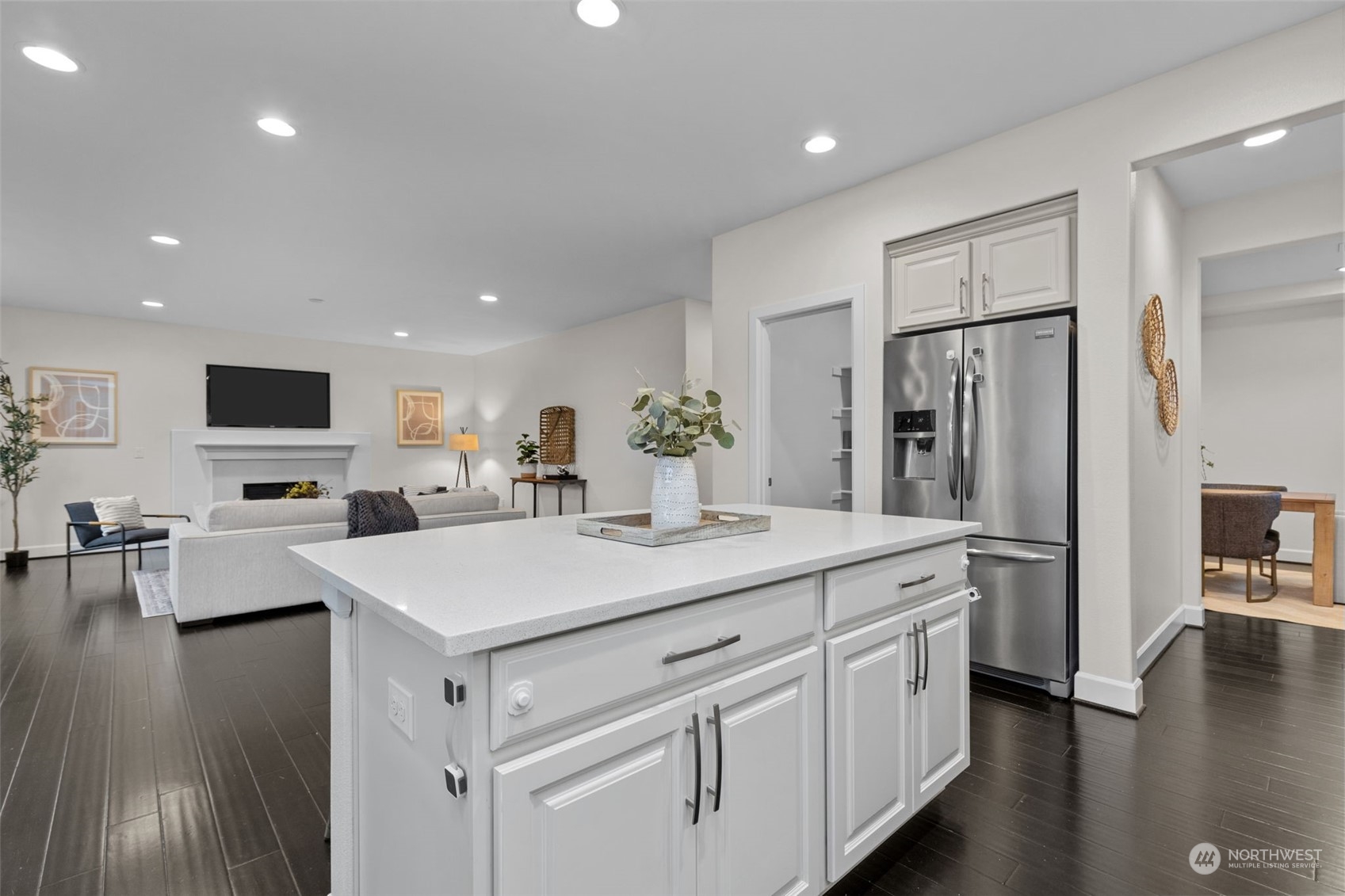 4123 175th Place Southeast Bothell, WA 98012 - Photo 11 of 40 a kitchen with white cabinets and stainless steel appliances