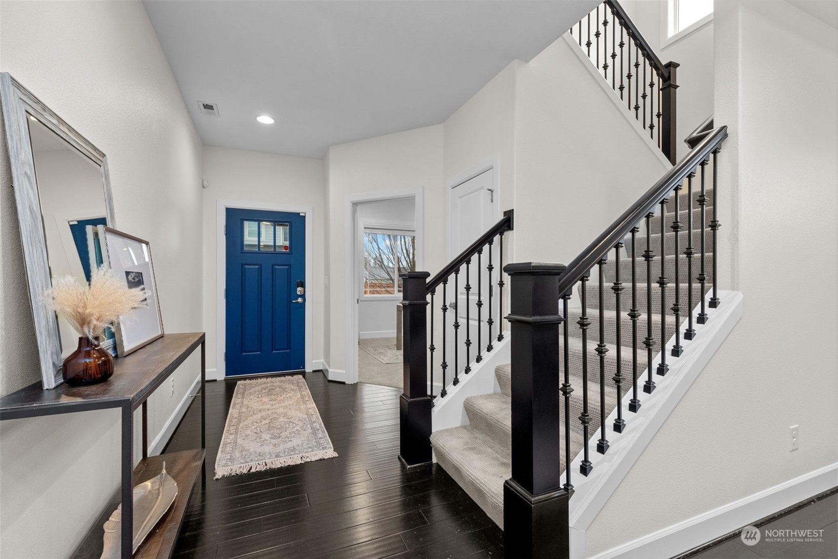 4123 175th Place Southeast Bothell, WA 98012 - Photo 20 of 40 a view of a hallway with wooden floor and stairs