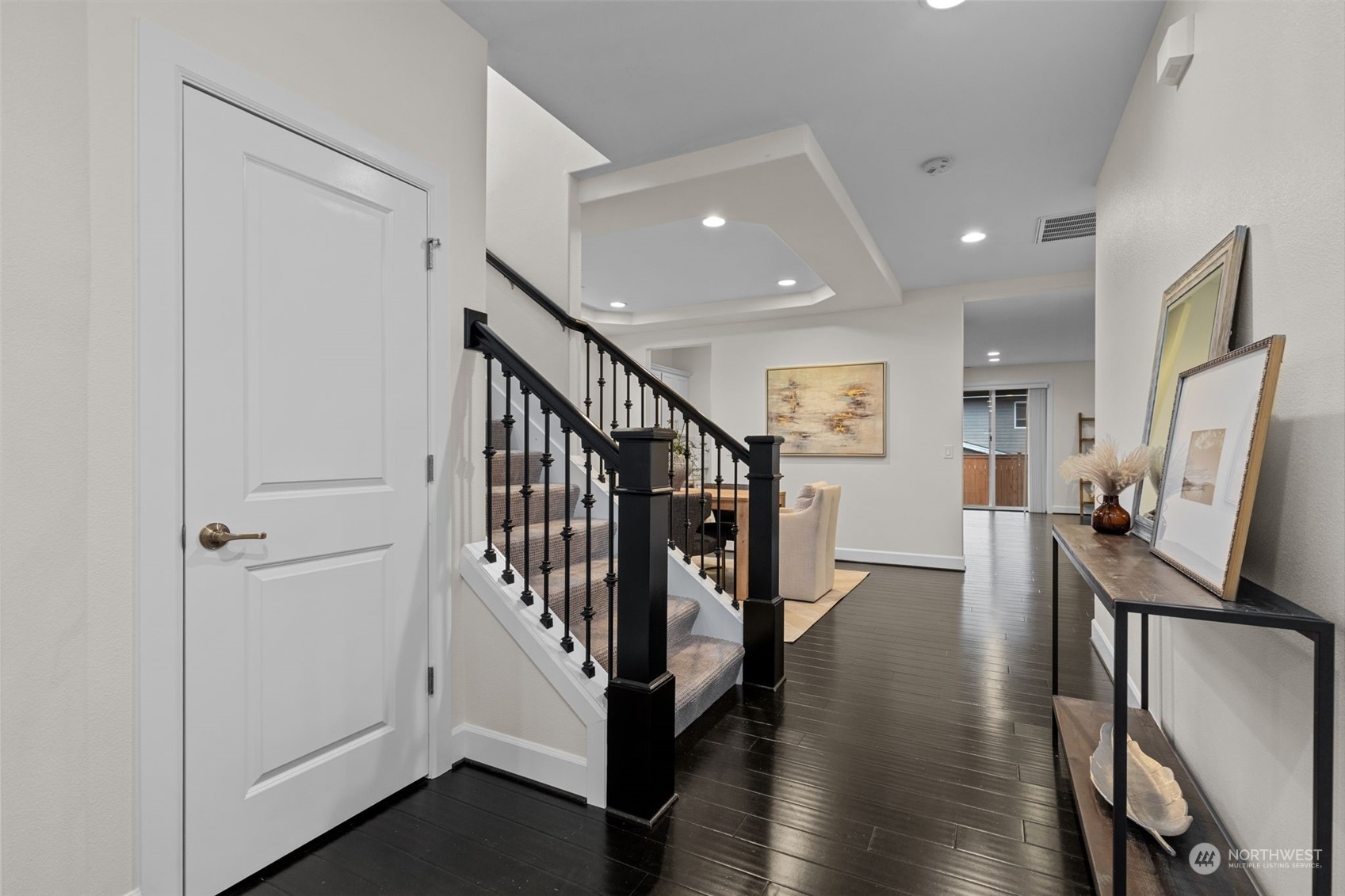 4123 175th Place Southeast Bothell, WA 98012 - Photo 2 of 40 a view of a hallway with wooden floor and staircase