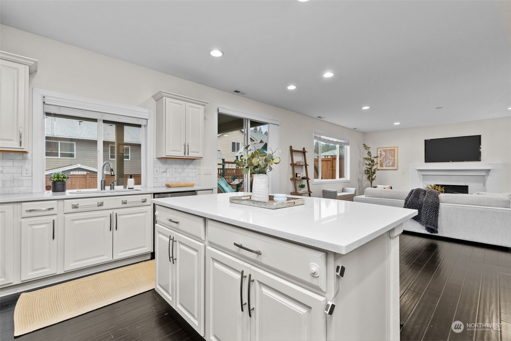 4123 175th Place Southeast Bothell, WA 98012 - Photo 9 of 40 a kitchen with a sink and white cabinets