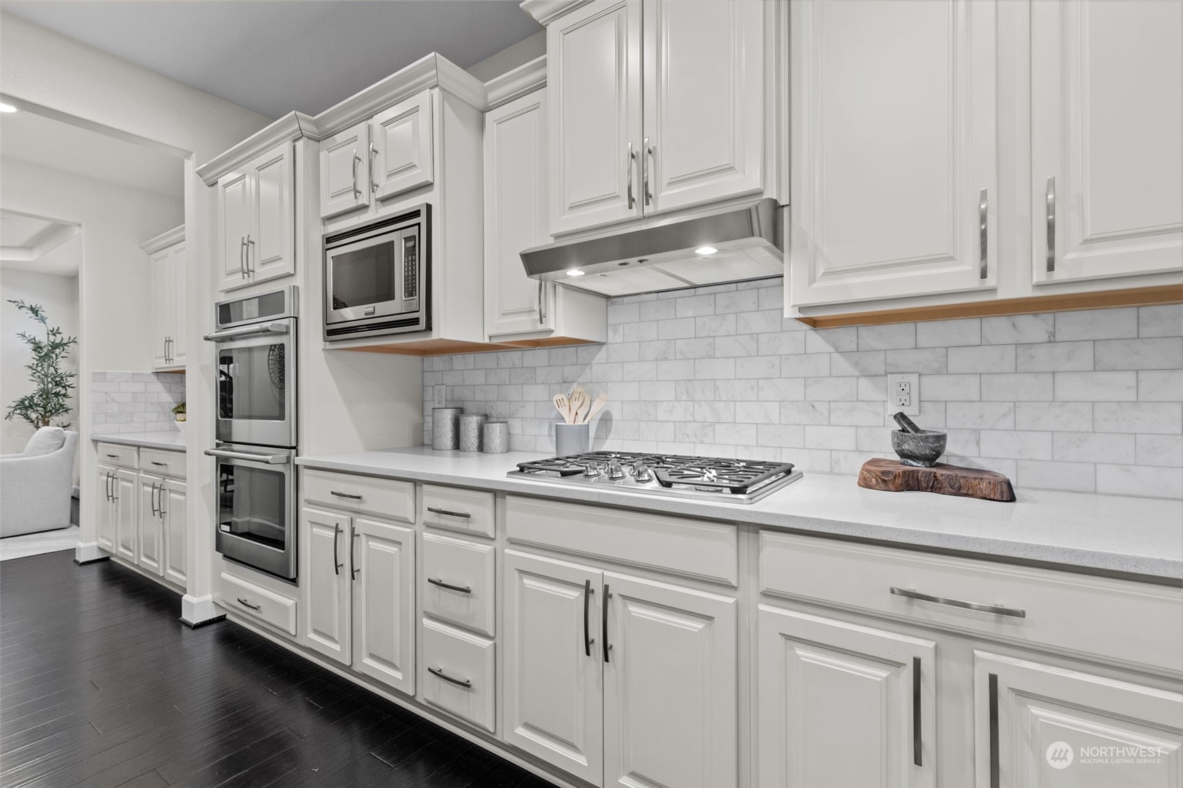 4123 175th Place Southeast Bothell, WA 98012 - Photo 10 of 40 a kitchen with white cabinets and white appliances