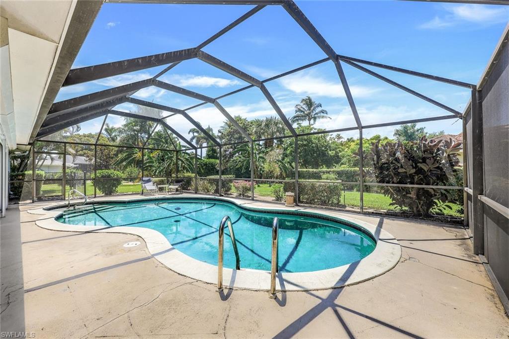 770 Anchor Rode Drive Naples, FL 34103 - Photo 23 of 26 The pool decking surrounding the freeform pool offers multiple areas for lounging and relaxing