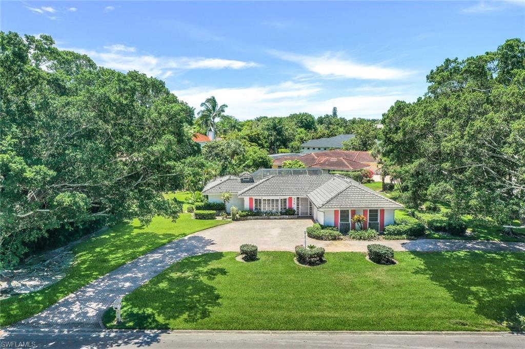 770 Anchor Rode Drive Naples, FL 34103 - Photo 5 of 26 The expansive road frontage provides for a very elegant setting