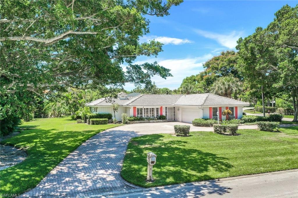 770 Anchor Rode Drive Naples, FL 34103 - Photo 6 of 26 The property is framed by two majestic Ficus trees
