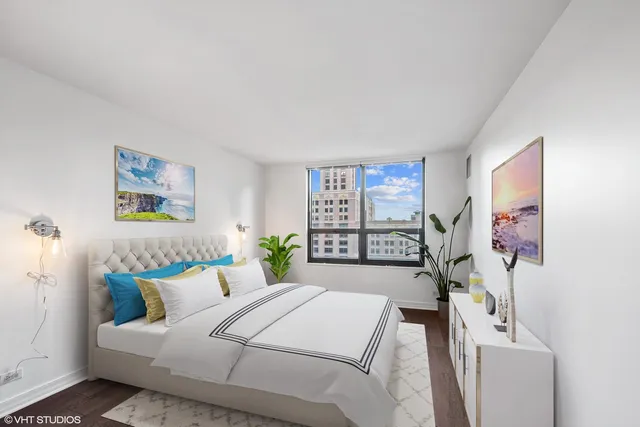 a bed room with a bed and a couch