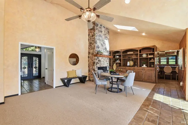 a bathroom with a sink a large mirror and a shower